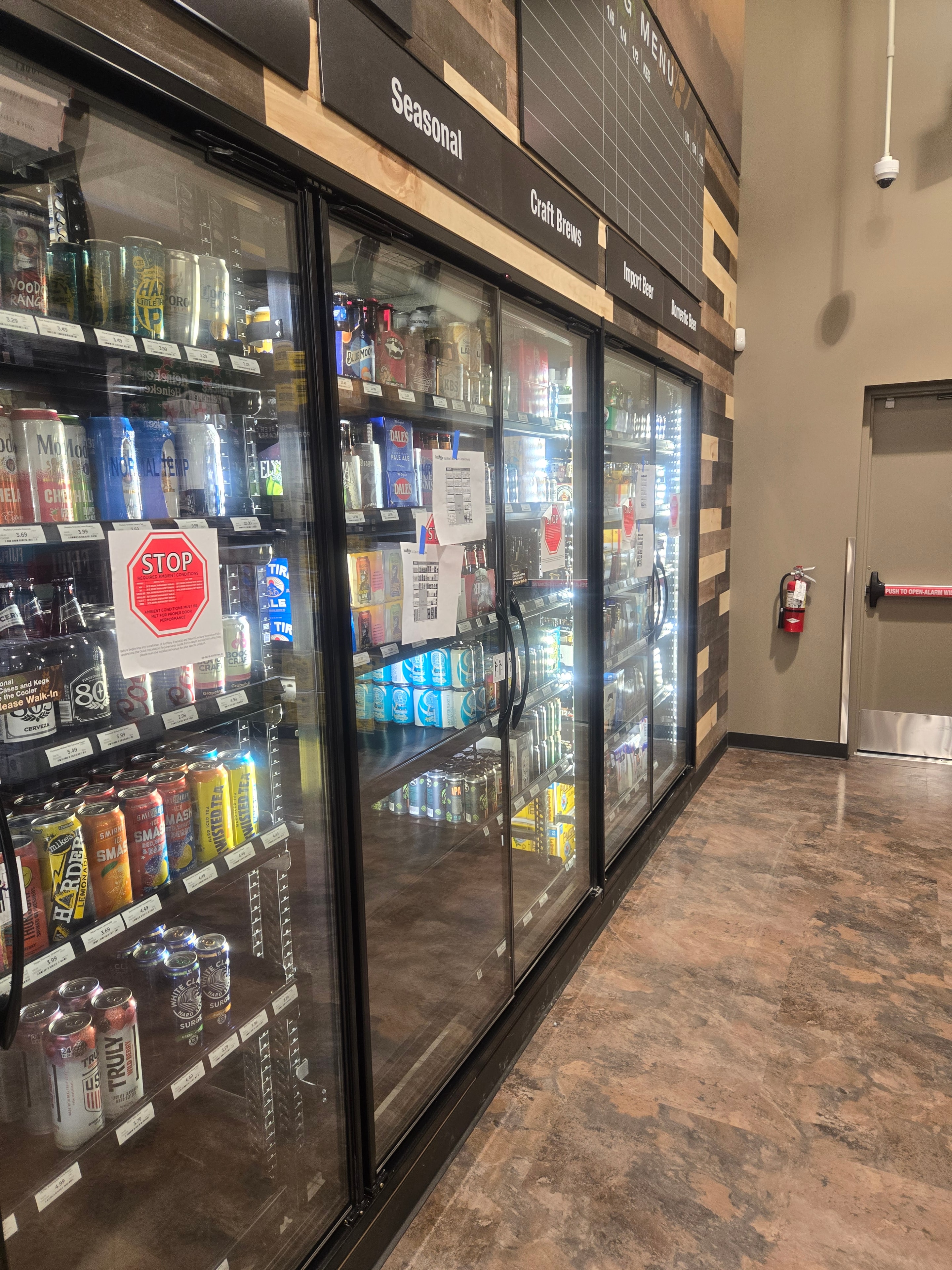 Completed display case stocked with beverages