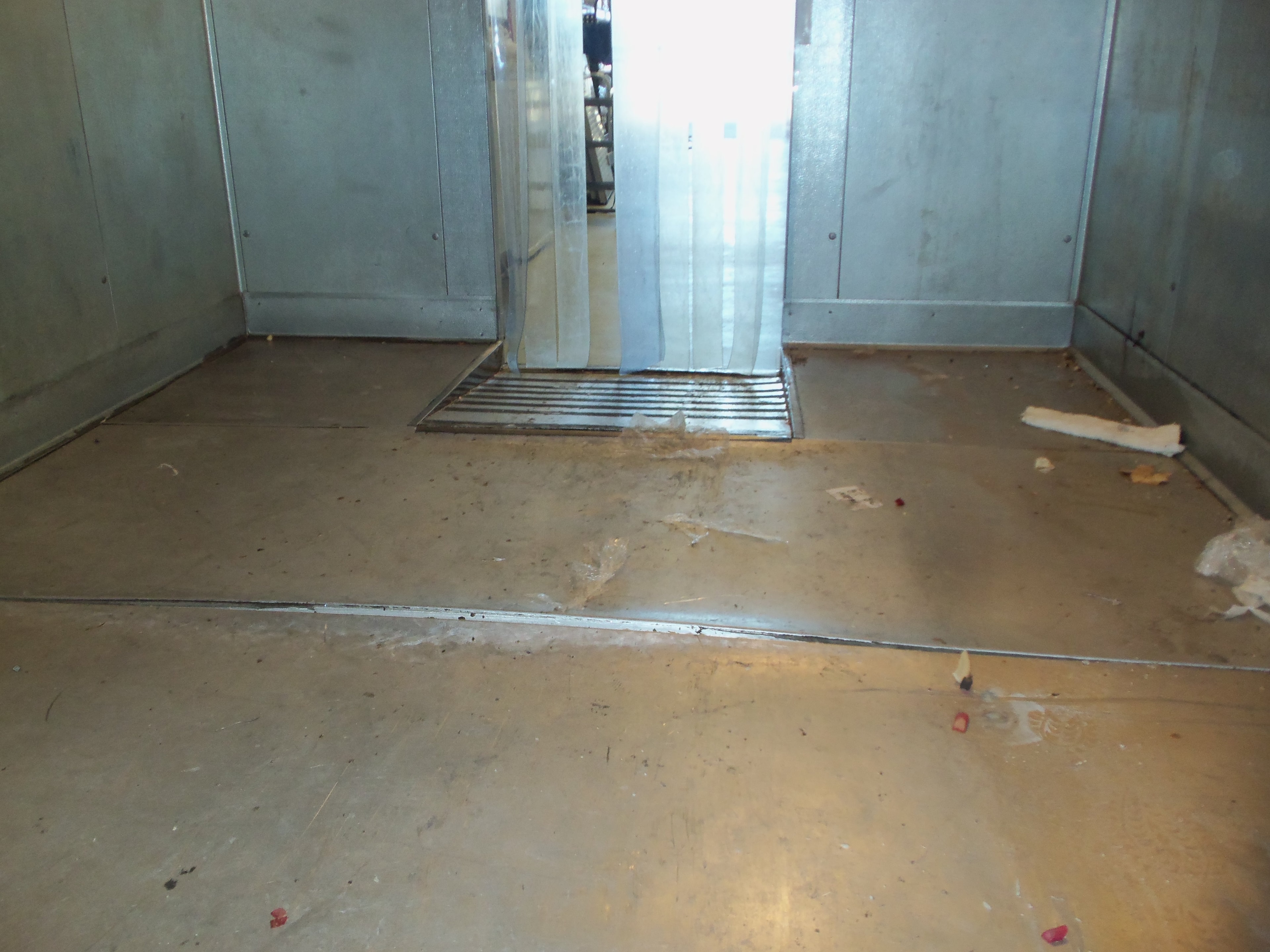 Existing walk-in freezer floor before repair